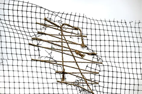 Rope cargo net on an obstacle