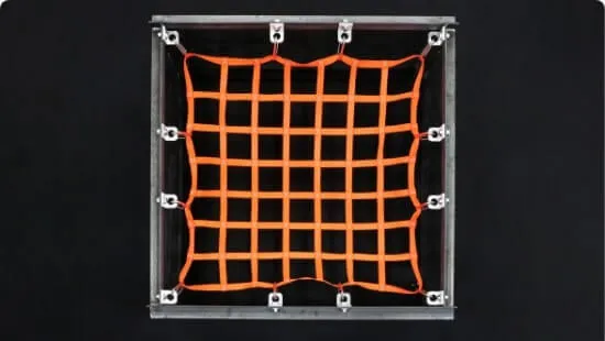 Orange hatch netting attached to a metal box